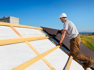 claremore roofer installing a new roof on a home